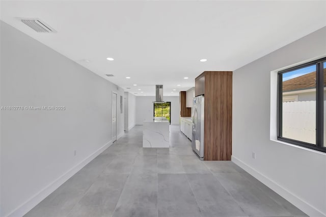 2411 NW 153rd St, Miami Gardens, FL 33054 - hall with baseboards, recessed lighting, and concrete flooring