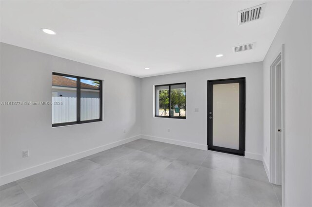2411 NW 153rd St, Miami Gardens, FL 33054 - unfurnished room featuring baseboards and recessed lighting