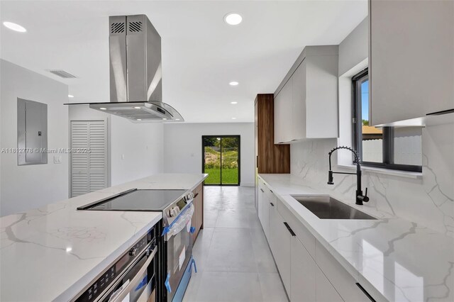 2411 NW 153rd St, Miami Gardens, FL 33054 - kitchen with island range hood, modern cabinets, a sink, electric panel, and stainless steel electric stove