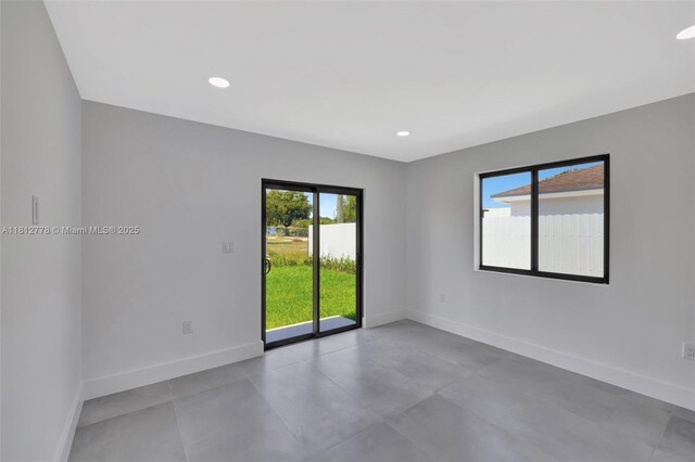 2411 NW 153rd St, Miami Gardens, FL 33054 - unfurnished room with baseboards and recessed lighting