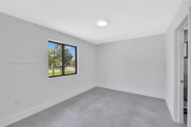 2411 NW 153rd St, Miami Gardens, FL 33054 - unfurnished room featuring baseboards
