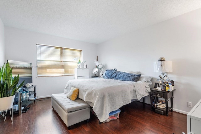 9235 SW 8th St Unit 502, Boca Raton, FL 33428 - bedroom with wood finished floors, baseboards, and a textured ceiling