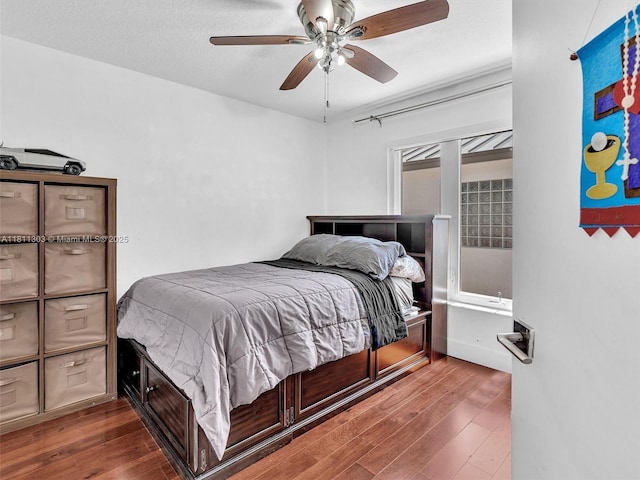 13381 SW 151st Ter, Miami, FL 33186 - bedroom with wood finished floors and a ceiling fan