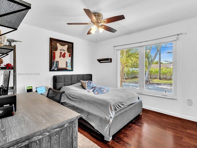 13381 SW 151st Ter, Miami, FL 33186 - bedroom with baseboards, hardwood / wood-style flooring, and a ceiling fan