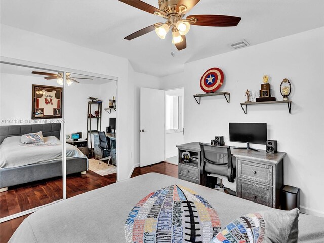 13381 SW 151st Ter, Miami, FL 33186 - bedroom with a desk, a ceiling fan, wood finished floors, baseboards, and a closet