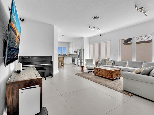 13381 SW 151st Ter, Miami, FL 33186 - living room with track lighting