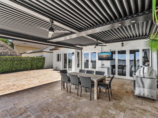 13381 SW 151st Ter, Miami, FL 33186 - view of patio / terrace with french doors, outdoor dining area, a ceiling fan, and a grill