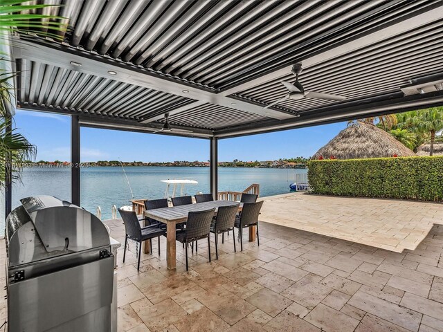 13381 SW 151st Ter, Miami, FL 33186 - view of patio featuring area for grilling, a water view, and outdoor dining area