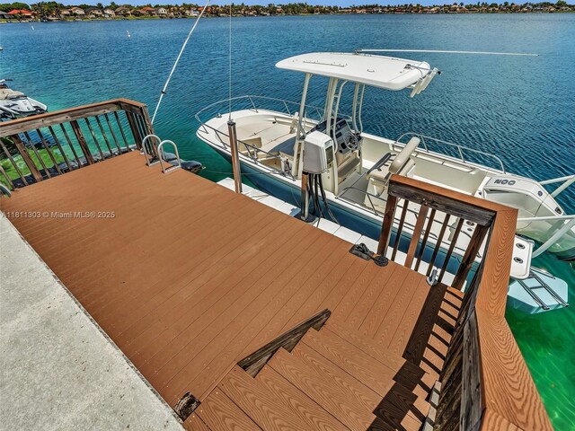 13381 SW 151st Ter, Miami, FL 33186 - dock with boat lift and a water view