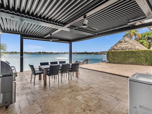13381 SW 151st Ter, Miami, FL 33186 - view of patio with outdoor dining area, a water view, and a grill