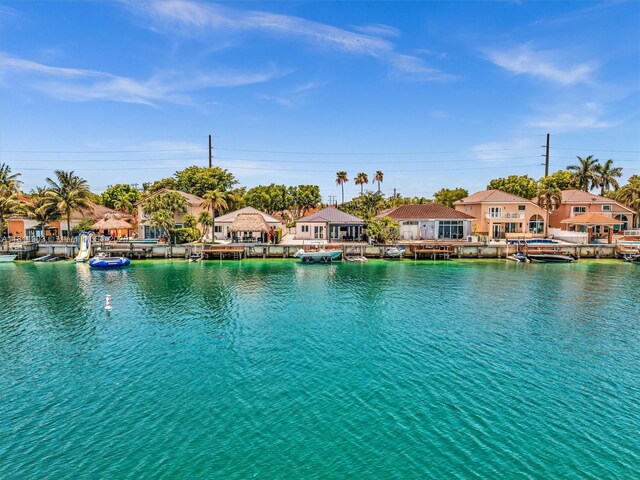 13381 SW 151st Ter, Miami, FL 33186 - water view featuring nearby suburban area and a boat dock