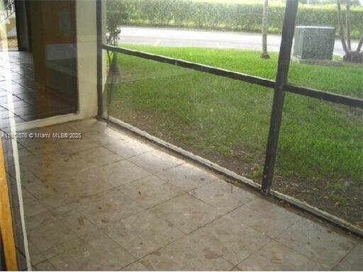 1061 Jefferson Dr Unit 1061B, Homestead, FL 33034 - view of unfurnished sunroom