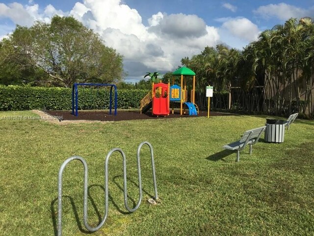 1061 Jefferson Dr Unit 1061B, Homestead, FL 33034 - community jungle gym with a lawn