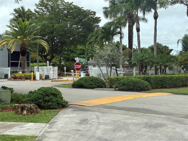1061 Jefferson Dr Unit 1061B, Homestead, FL 33034 - view of asphalt road with traffic signs