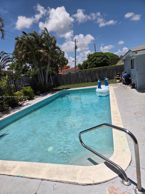 1601 SW 2nd Ave, Pompano Beach, FL 33060 - view of pool with a fenced backyard and a patio