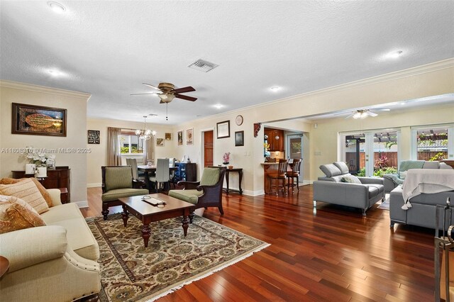 991 Dove Ave, Miami Springs, FL 33166 - living area featuring ceiling fan, crown molding, wood finished floors, and a textured ceiling