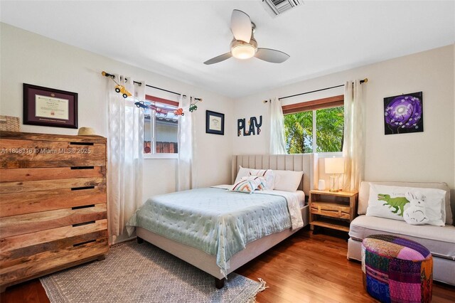 991 Dove Ave, Miami Springs, FL 33166 - bedroom with wood finished floors and a ceiling fan