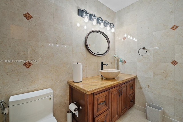 991 Dove Ave, Miami Springs, FL 33166 - bathroom featuring tile walls, vanity, and toilet