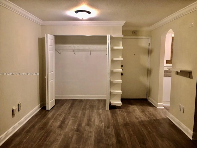 17255 SW 95th Ave Unit D-349, Palmetto Bay, FL 33157 - unfurnished bedroom with arched walkways, wood finished floors, ornamental molding, and baseboards