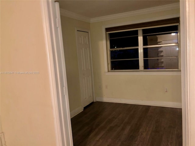 17255 SW 95th Ave Unit D-349, Palmetto Bay, FL 33157 - spare room featuring dark wood-style flooring, baseboards, and ornamental molding