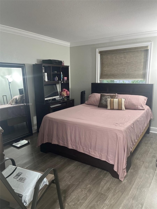 17255 SW 95th Ave Unit D-349, Palmetto Bay, FL 33157 - bedroom with wood finished floors, ornamental molding, and a textured ceiling