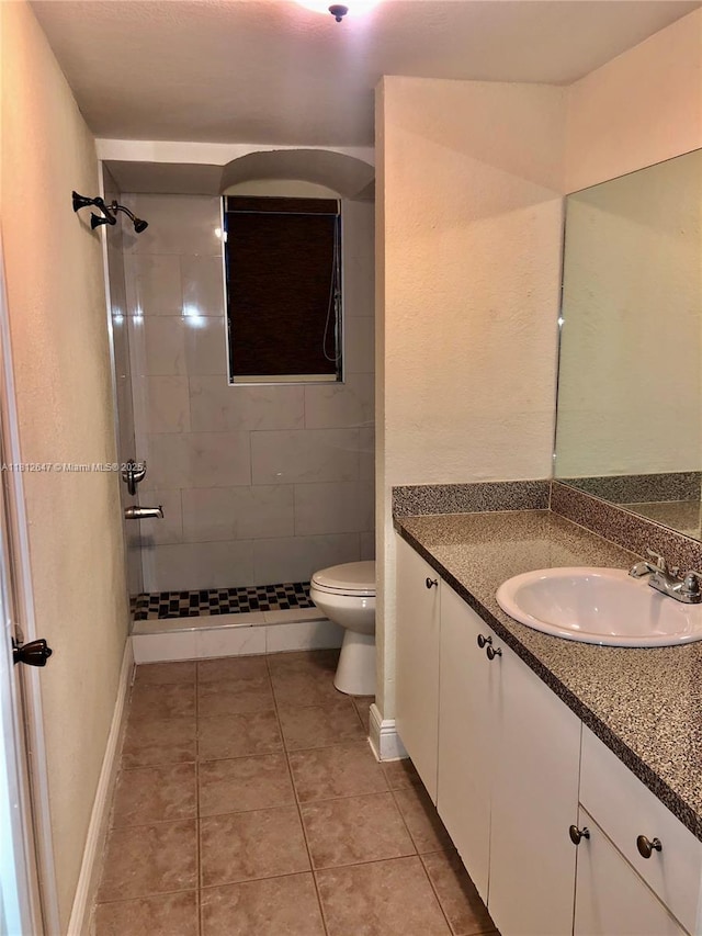 17255 SW 95th Ave Unit D-349, Palmetto Bay, FL 33157 - bathroom with vanity, tiled shower, and tile patterned floors