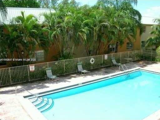 17255 SW 95th Ave Unit D-349, Palmetto Bay, FL 33157 - community pool featuring a patio area