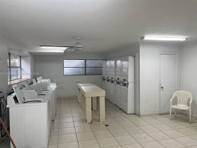 17255 SW 95th Ave Unit D-349, Palmetto Bay, FL 33157 - communal laundry room featuring crown molding, washer and clothes dryer, estacked washer and dryer, a ceiling fan, and light tile patterned flooring