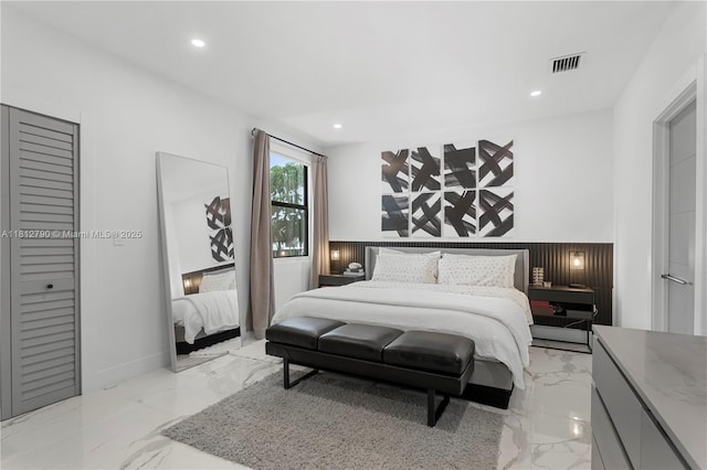 2320 SW 14th St, Miami, FL 33145 - bedroom featuring light marble finish floors and recessed lighting