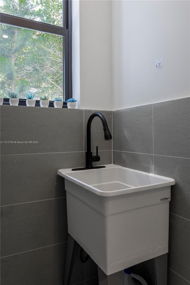 2320 SW 14th St, Miami, FL 33145 - bathroom featuring tile walls and a wainscoted wall