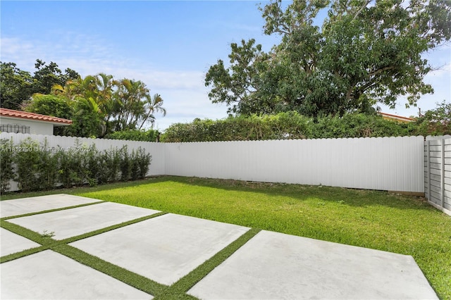 2320 SW 14th St, Miami, FL 33145 - fenced backyard featuring a patio