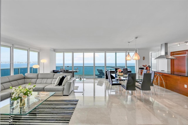 1830 S Ocean Dr Unit 3801, Hallandale Beach, FL 33009 - living area featuring plenty of natural light, floor to ceiling windows, a water view, and marble tiled floors
