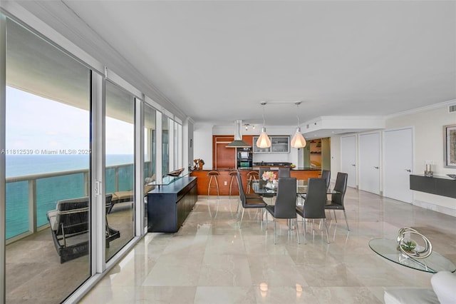 1830 S Ocean Dr Unit 3801, Hallandale Beach, FL 33009 - dining room with light marble finish floors, crown molding, and a water view