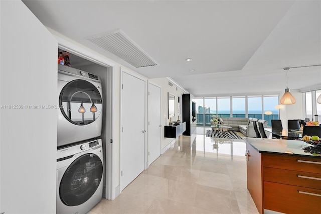 1830 S Ocean Dr Unit 3801, Hallandale Beach, FL 33009 - laundry area with estacked washer and dryer and a water view