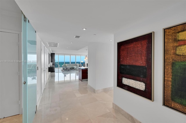 1830 S Ocean Dr Unit 3801, Hallandale Beach, FL 33009 - corridor with a wall of windows, baseboards, and recessed lighting