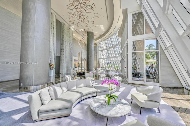 1830 S Ocean Dr Unit 3801, Hallandale Beach, FL 33009 - living room featuring a towering ceiling and ornate columns