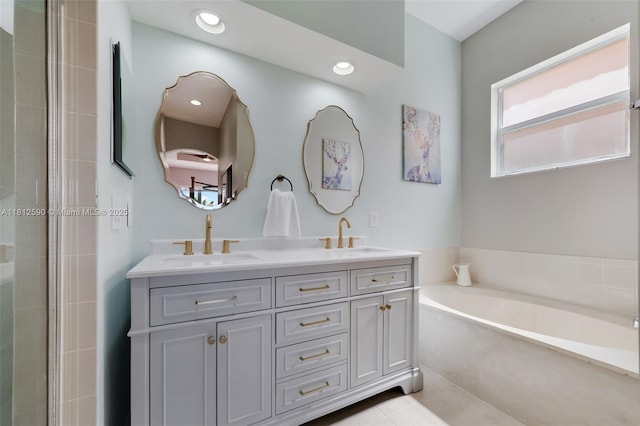 2046 SE 18th St, Homestead, FL 33035 - full bath with double vanity, a bath, tiled shower, and recessed lighting