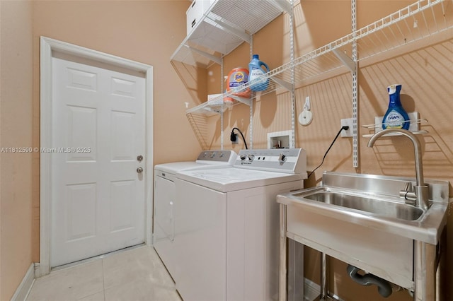 2046 SE 18th St, Homestead, FL 33035 - laundry area featuring washer and dryer and light tile patterned floors