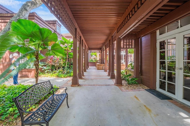 4000 Towerside Ter Unit 1403, Miami, FL 33138 - view of patio featuring french doors