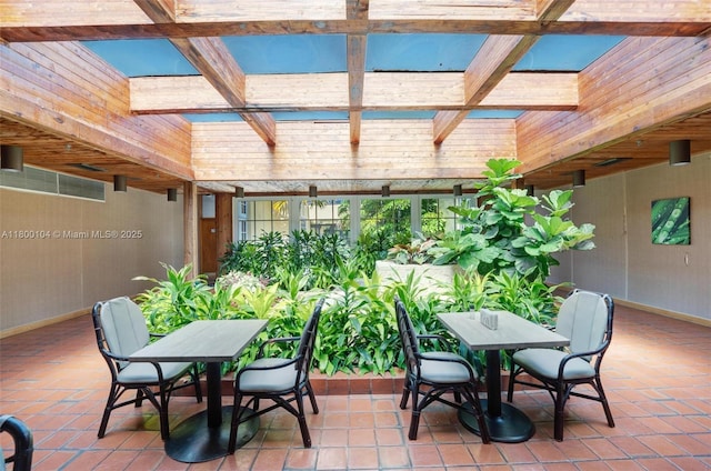4000 Towerside Ter Unit 1403, Miami, FL 33138 - view of patio featuring outdoor dining area and a pergola
