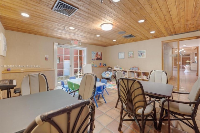 4000 Towerside Ter Unit 1403, Miami, FL 33138 - dining area featuring wooden ceiling, french doors, recessed lighting, and tile patterned flooring
