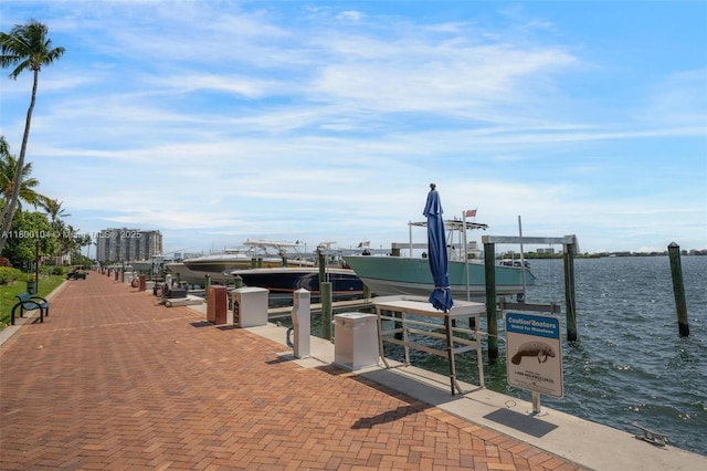 4000 Towerside Ter Unit 1403, Miami, FL 33138 - view of home's community with boat lift, a dock, and a water view