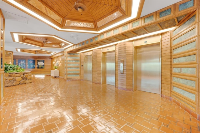 4000 Towerside Ter Unit 1403, Miami, FL 33138 - building lobby featuring wood ceiling