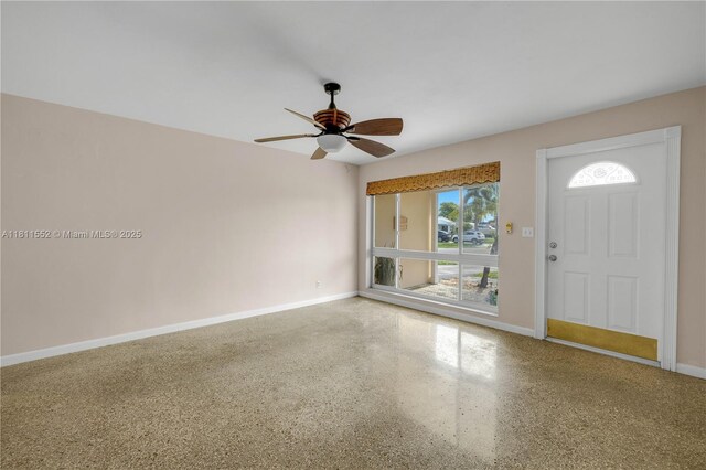 4051 NE 17th Ter, Pompano Beach, FL 33064 - foyer with baseboards, speckle patterned floor, and ceiling fan