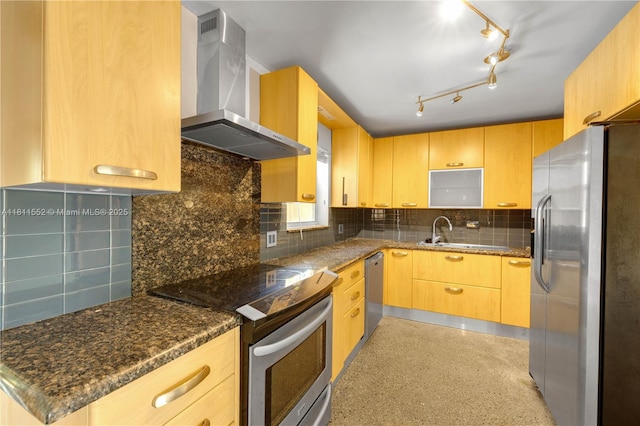 4051 NE 17th Ter, Pompano Beach, FL 33064 - kitchen with stainless steel appliances, wall chimney exhaust hood, a sink, and decorative backsplash