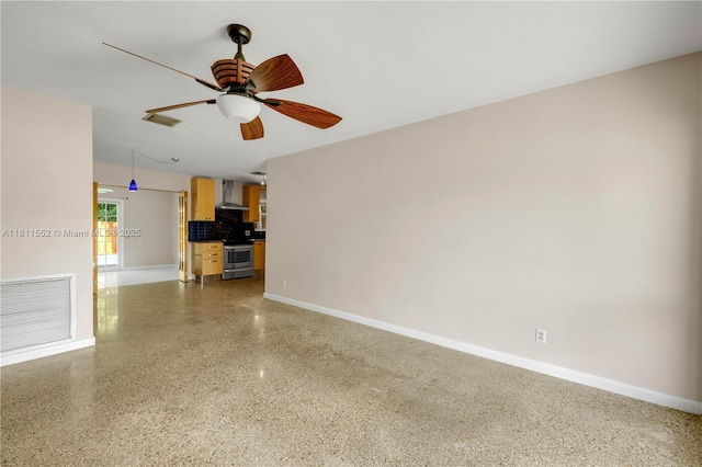 4051 NE 17th Ter, Pompano Beach, FL 33064 - unfurnished living room with speckled floor, baseboards, and a ceiling fan