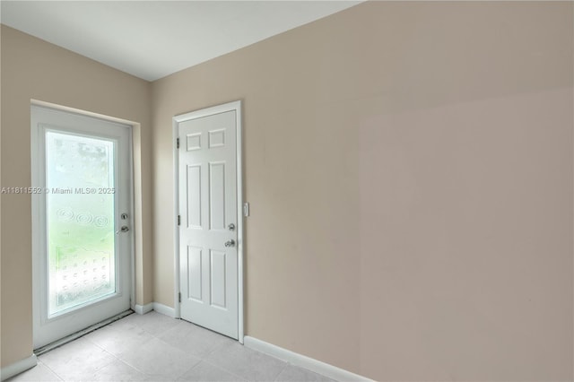4051 NE 17th Ter, Pompano Beach, FL 33064 - unfurnished room with baseboards and light tile patterned flooring