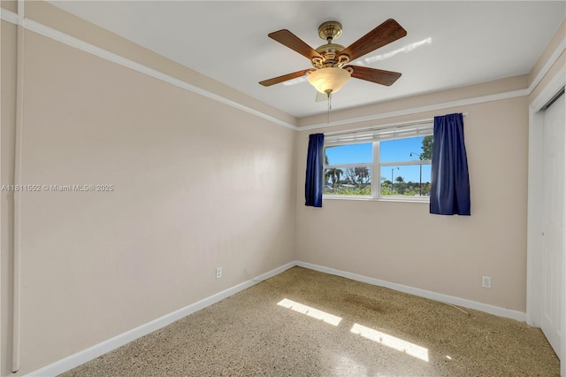 4051 NE 17th Ter, Pompano Beach, FL 33064 - unfurnished room with baseboards and a ceiling fan