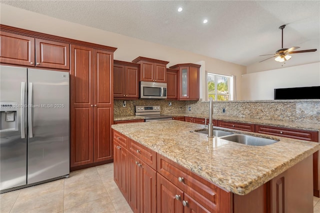 17368 SW 22nd Ct, Miramar, FL 33029 - kitchen with appliances with stainless steel finishes, lofted ceiling, a sink, backsplash, and ceiling fan