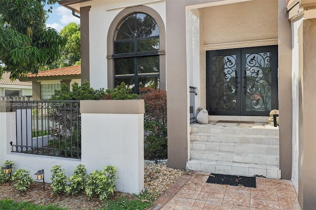 15050 E Falcons Lea Dr, Davie, FL 33331 - entrance to property with french doors and stucco siding